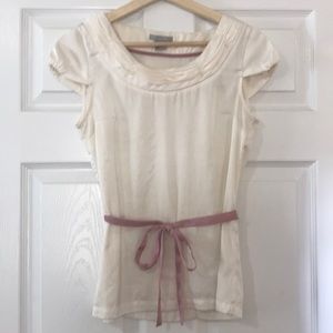 Cream top with pink tie